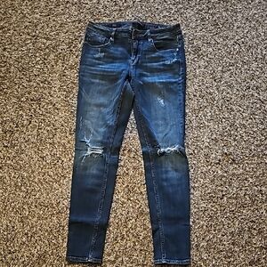 Women's Distressed Blue Jeans